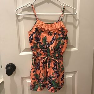 peach romper with palm leaves